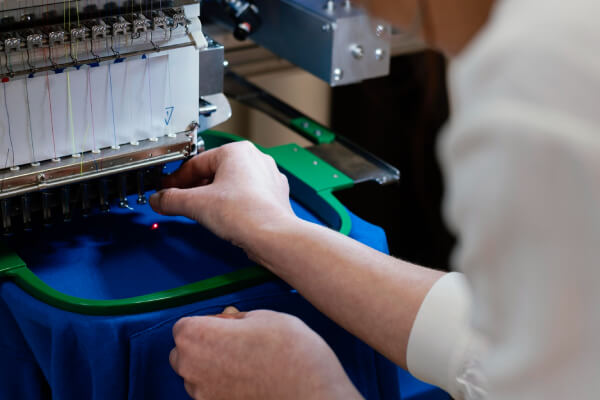Personalization of work clothing with embroidery