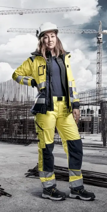Woman posing with high visibility outfit